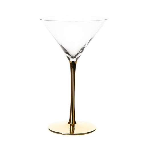 clear martini glass with gold stem on white background